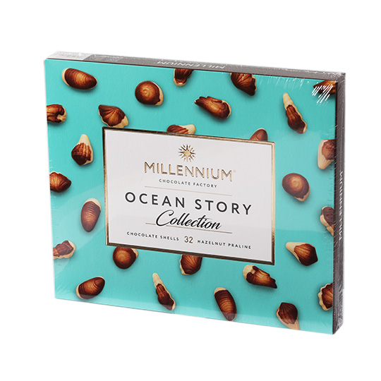 Цукерки шоколадні Millennium Історії океану з горіховим праліне 340г