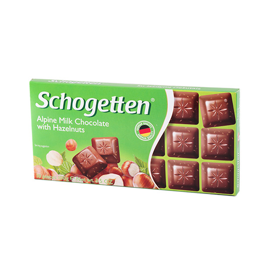 Шоколад Schogetten молочний з подрібненими ядрами горіха фундука 100г